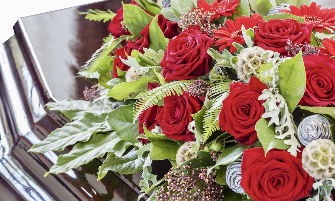 flowers on casket